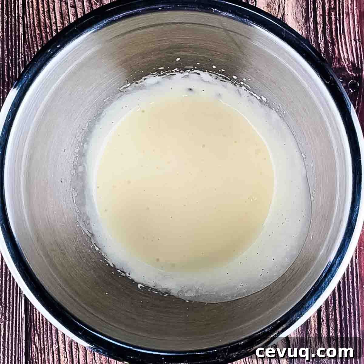The egg yolks after they are mixed until they are light and fluffy.