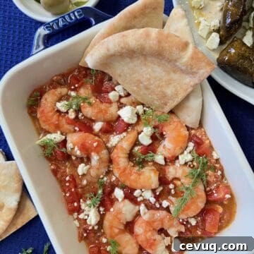 Baked shrimp in white pan.
