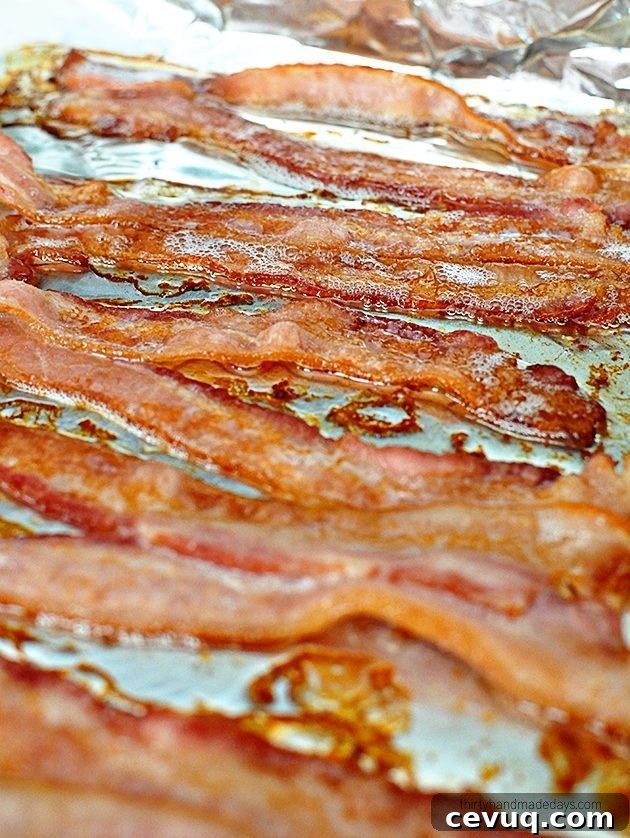 The easiest way to make bacon - in the oven! So simple and tastes fabulous.  www.thirtyhandmadedays.com