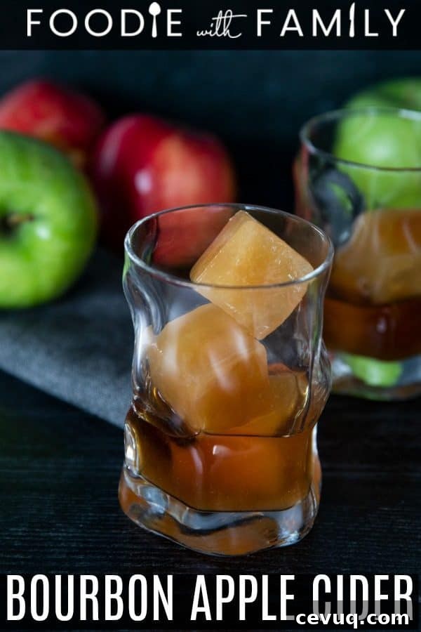 Final glass of bourbon apple cider with cider ice cubes