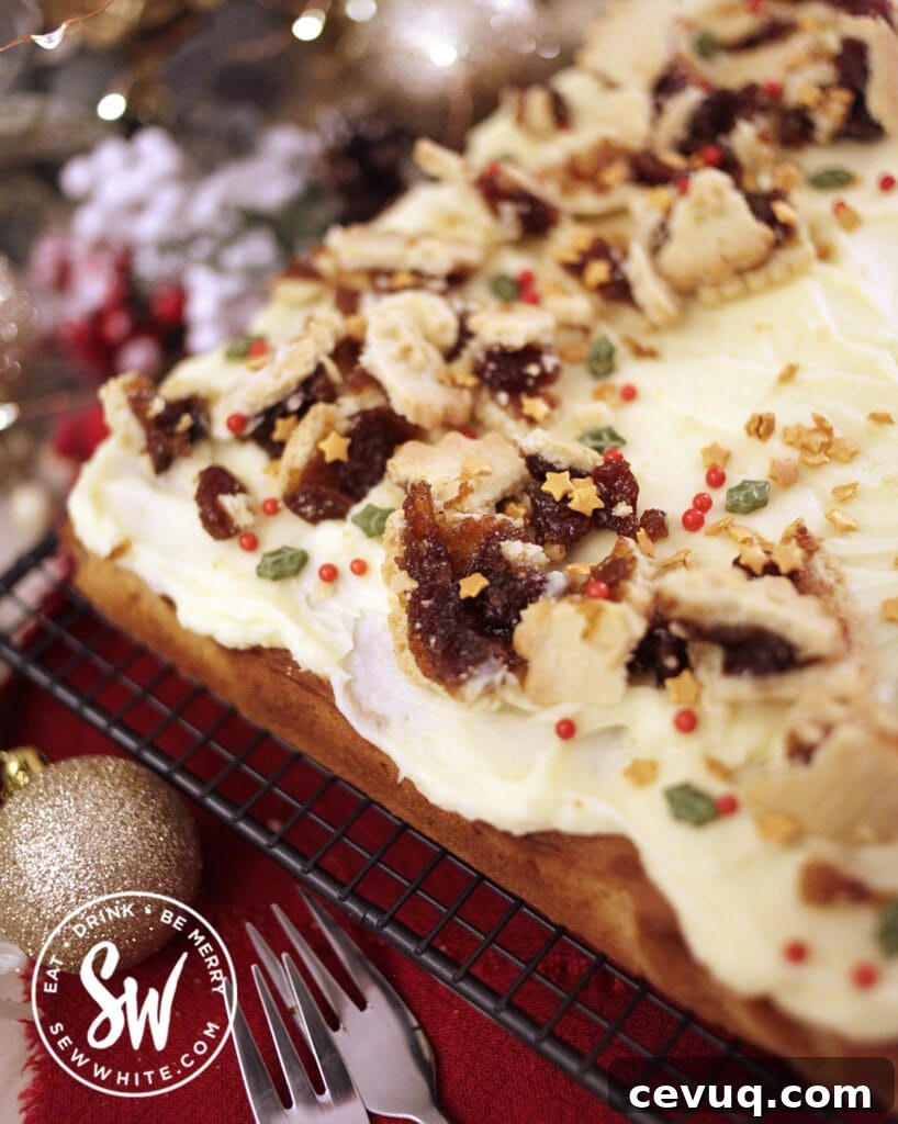 Mincemeat Cake: Festive Mince Pie Layer Cake Recipe 8 Mince pies in cake and used as decoration on a christmas traybake.
