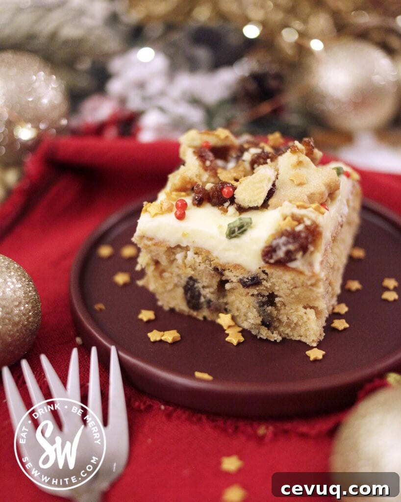 Mincemeat Cake: Festive Mince Pie Layer Cake Recipe 12 Slice of mince pie cake with cream cheese frosting decorated with mince pies