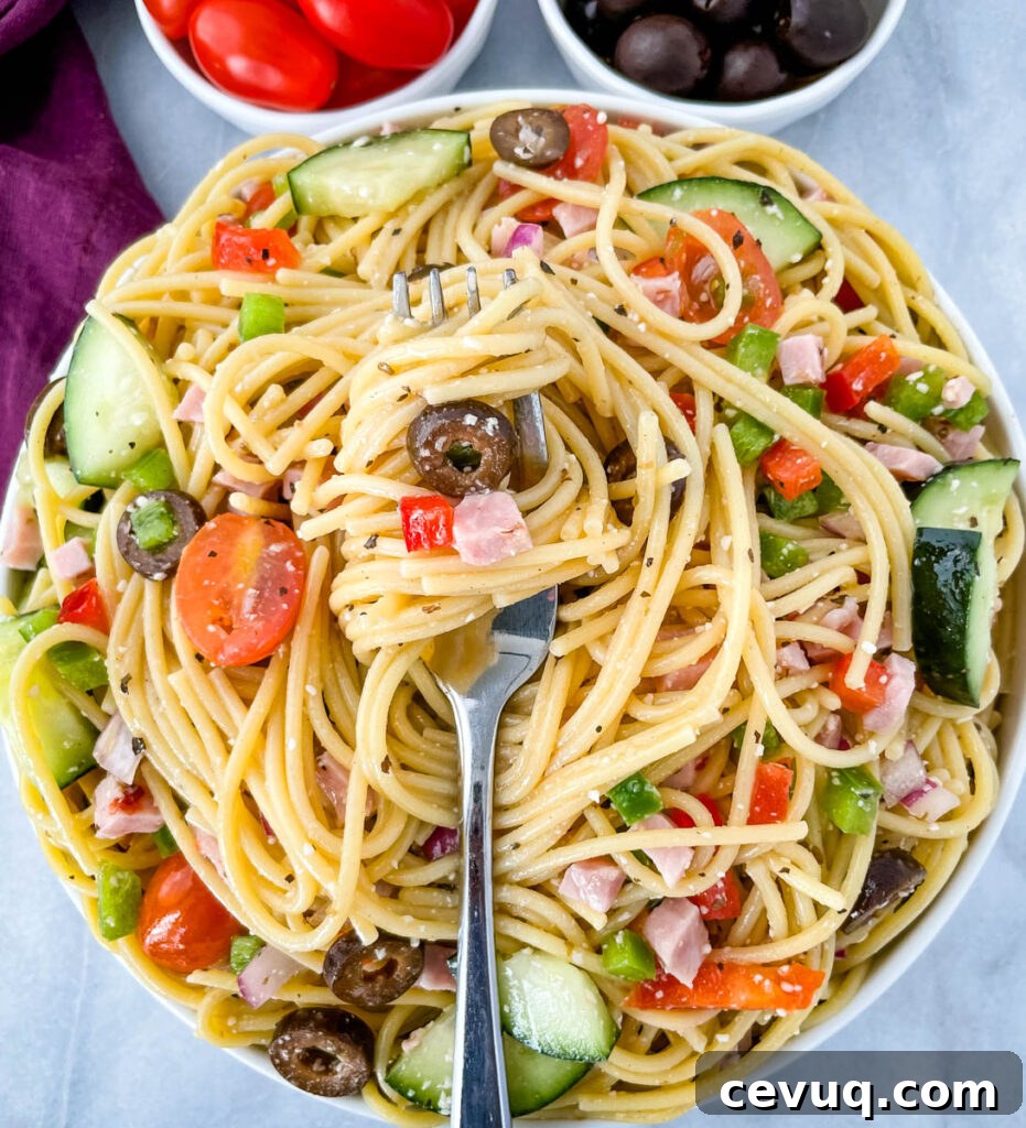 a forkful of spaghetti salad