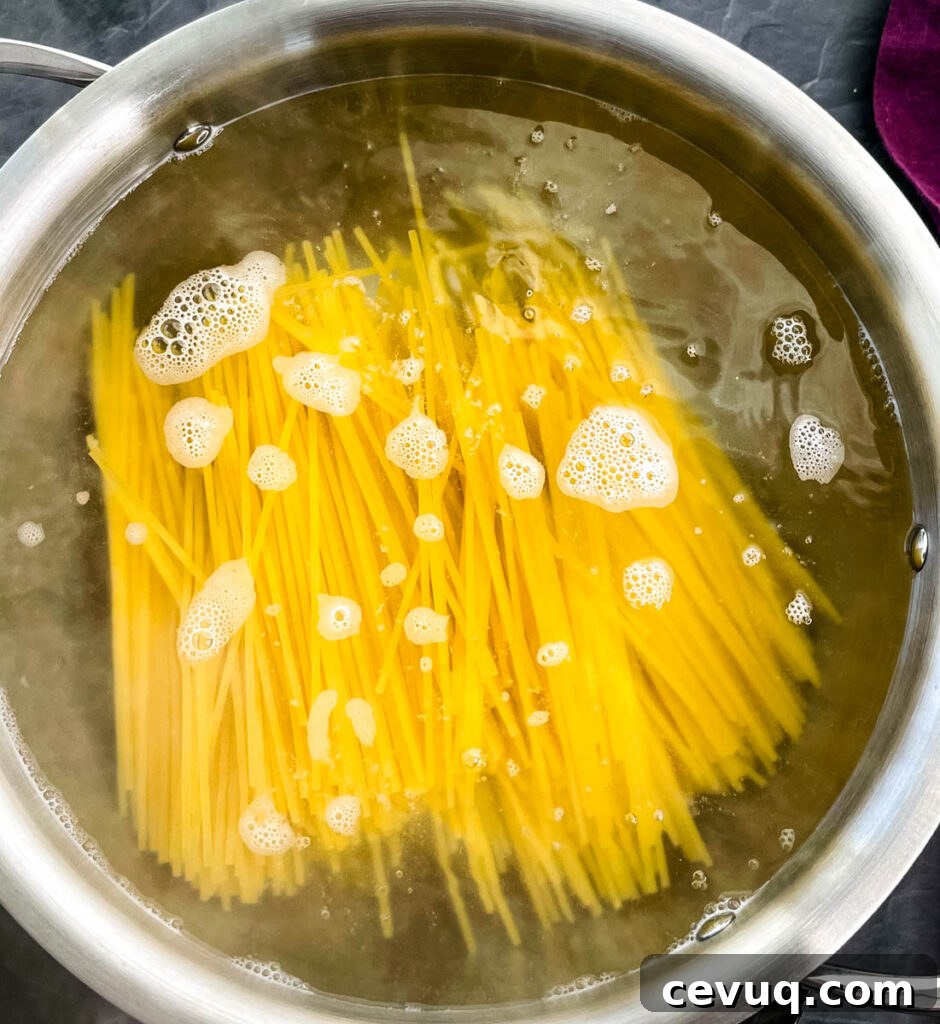 spaghetti boiling in a pot