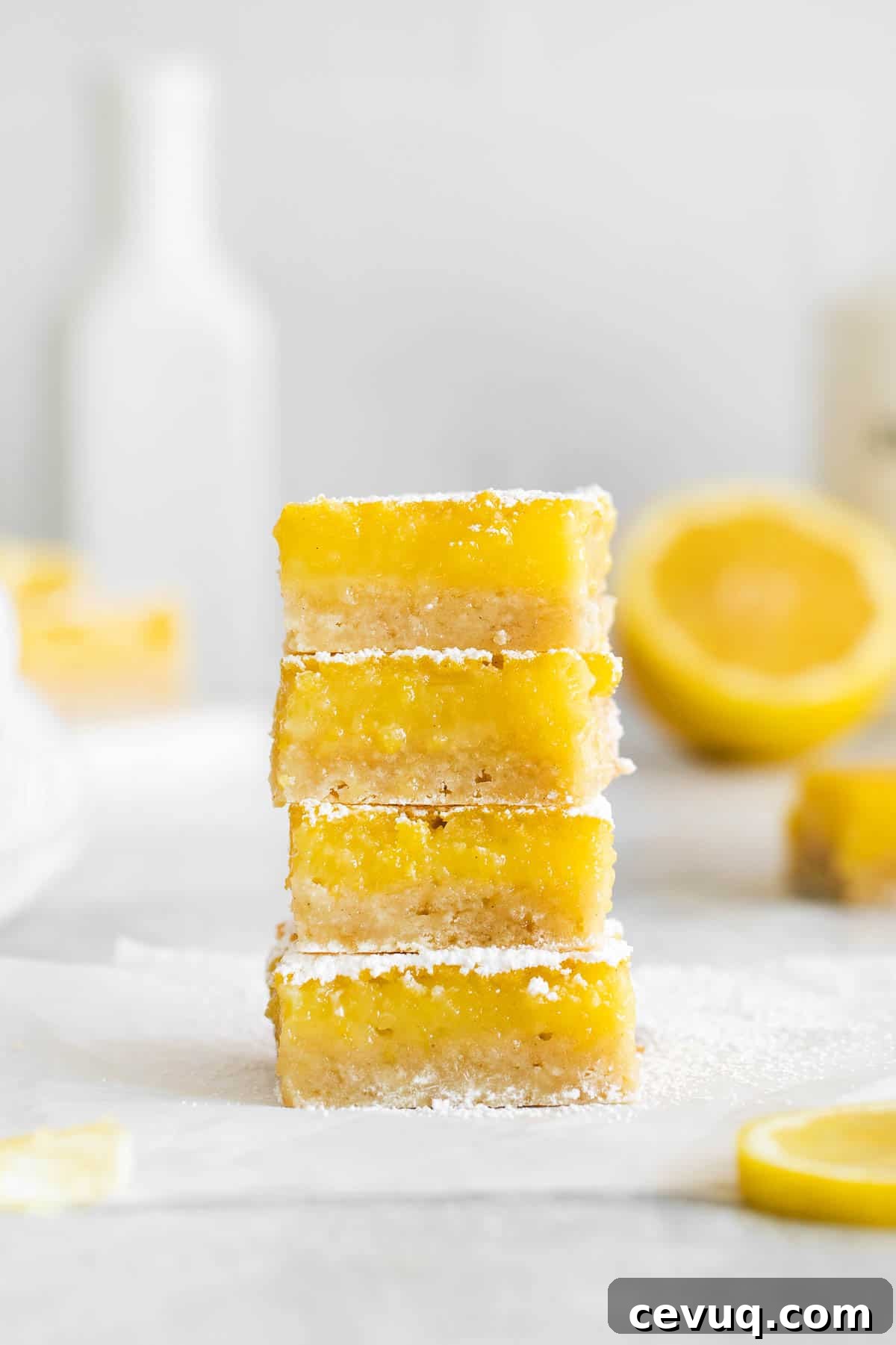 gluten-free lemon bars stacked on top of each other.