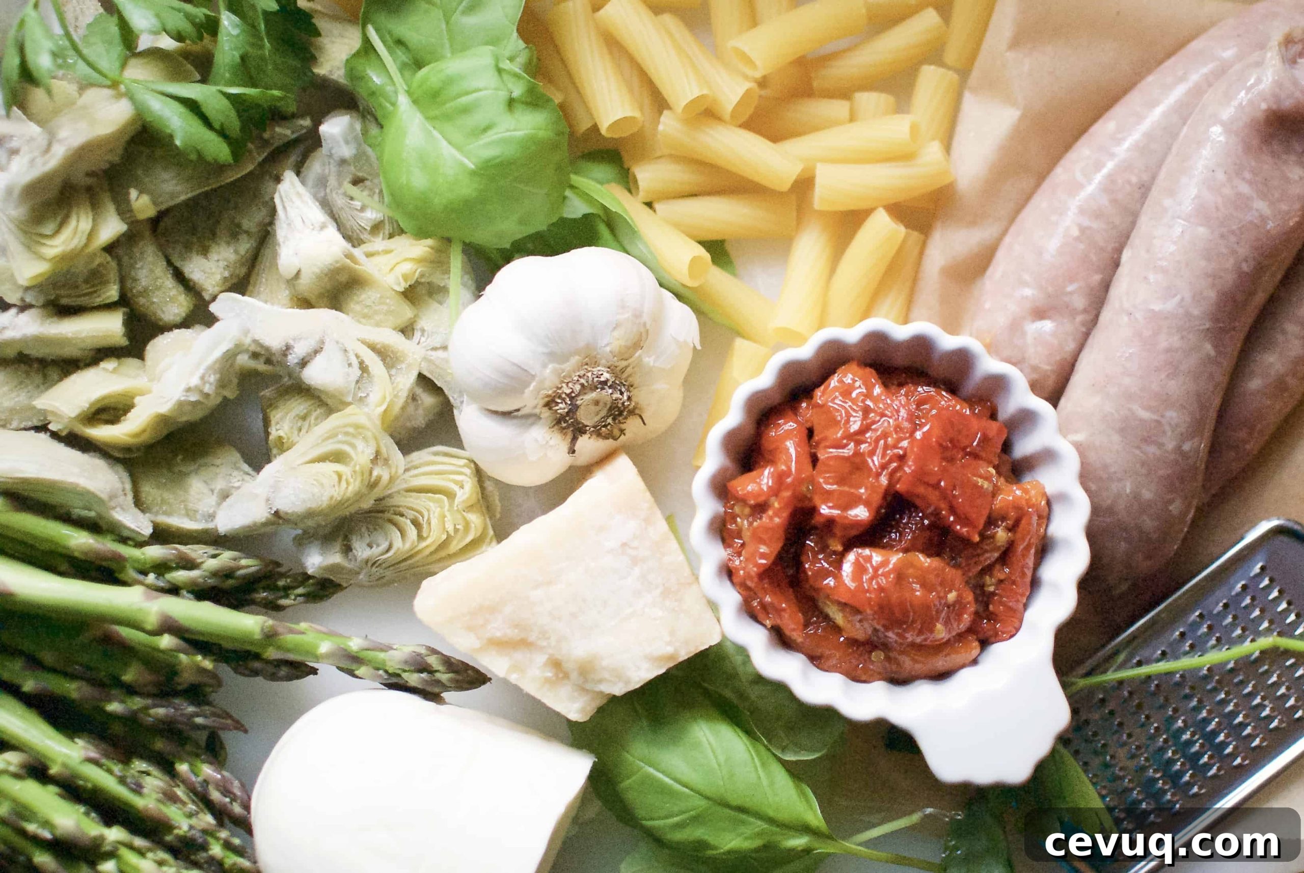rigatoni with sausage, artichokes & asparagus