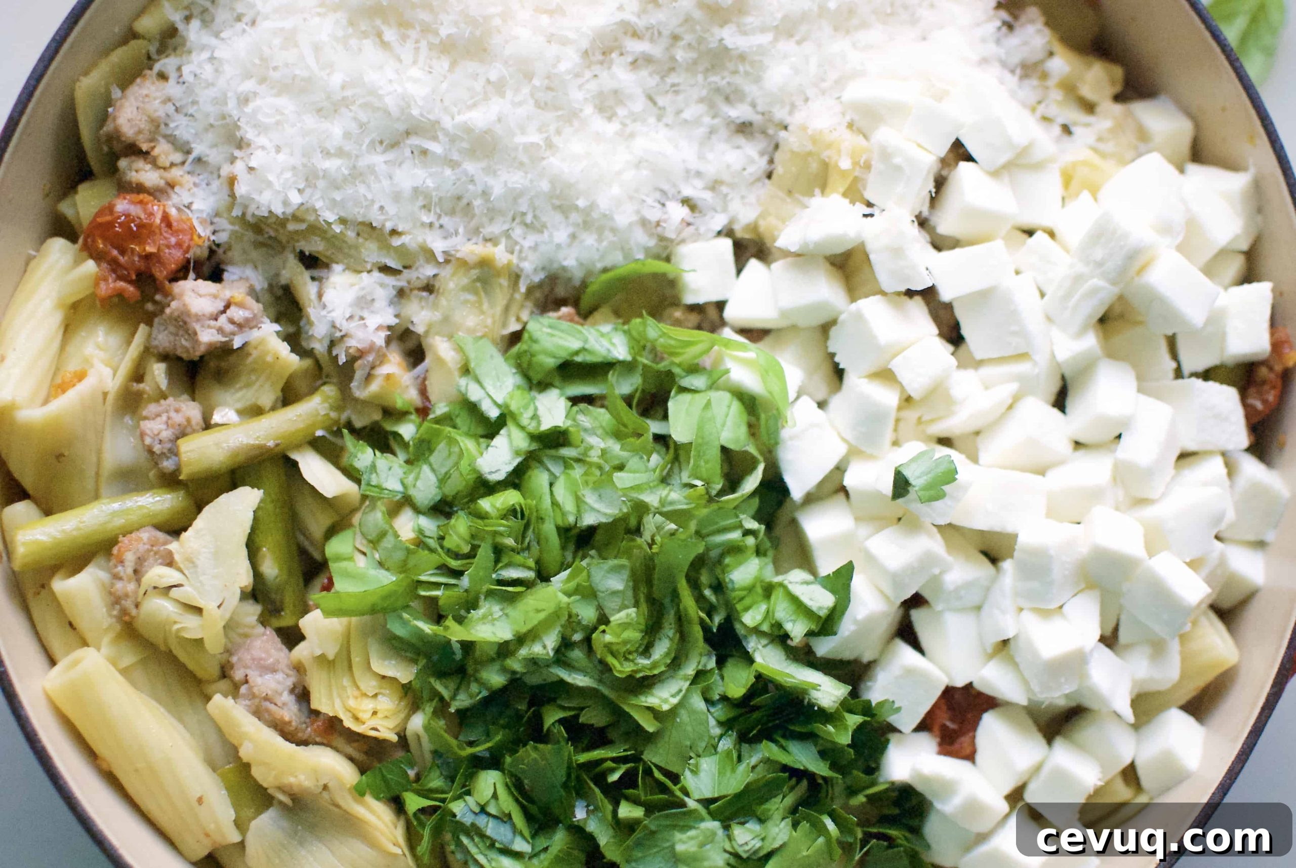 rigatoni with sausage, artichokes & asparagus