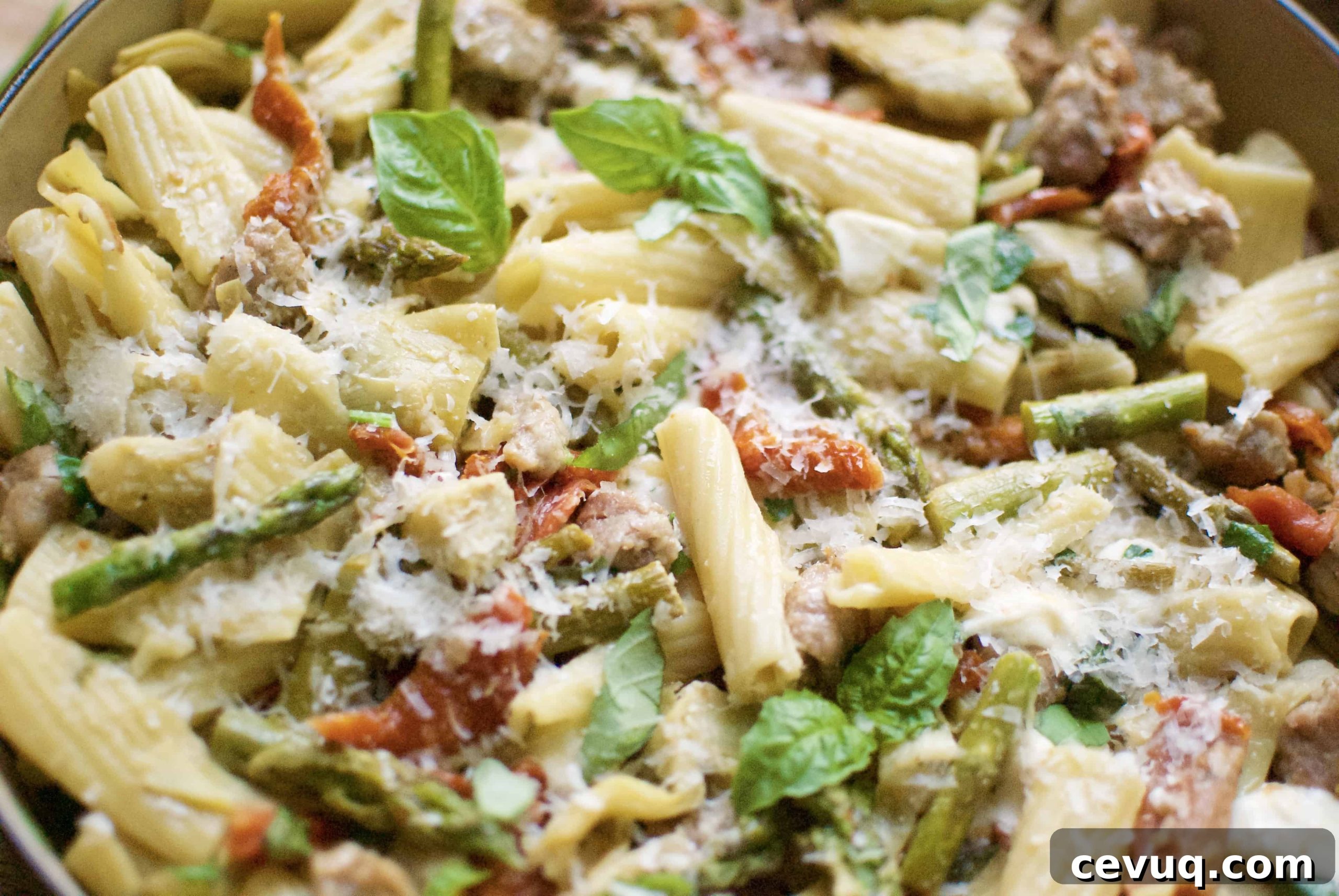 rigatoni with sausage, artichokes & asparagus