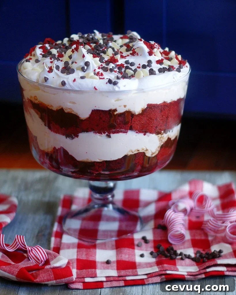 A layered red velvet cake trifle with white chocolate Cheesecake filling