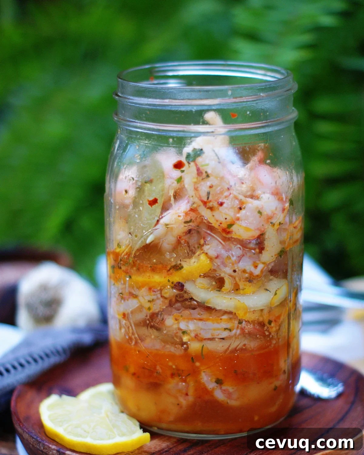 making pickled shrimp in a jar