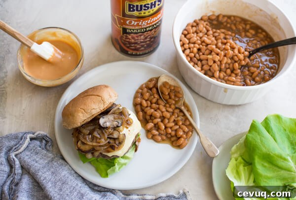 Burger on plate with beans