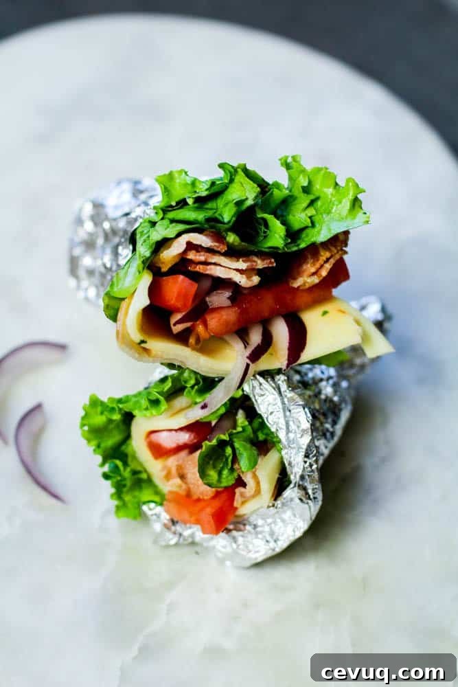 Low Carb BLT turkey wrap on a marble tray
