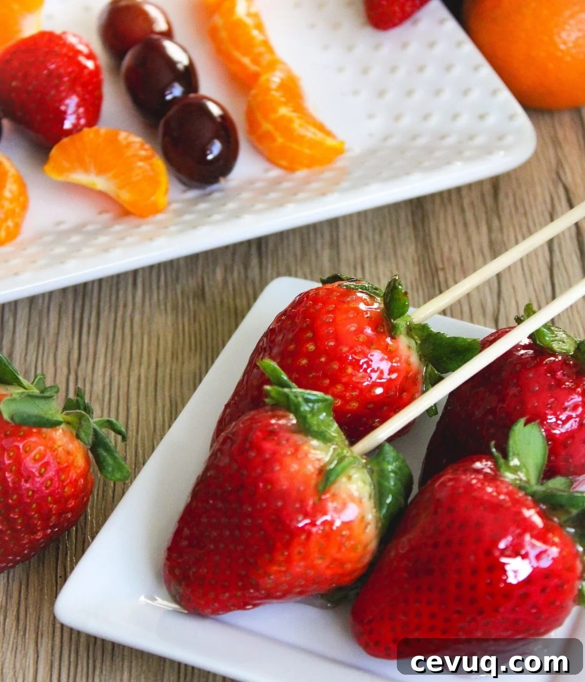 Tanghulu: Traditional Chinese Candied Fruit Guide & Recipe 2 Tanghulu, or Chinese candied fruit on skewers ready to be eaten.