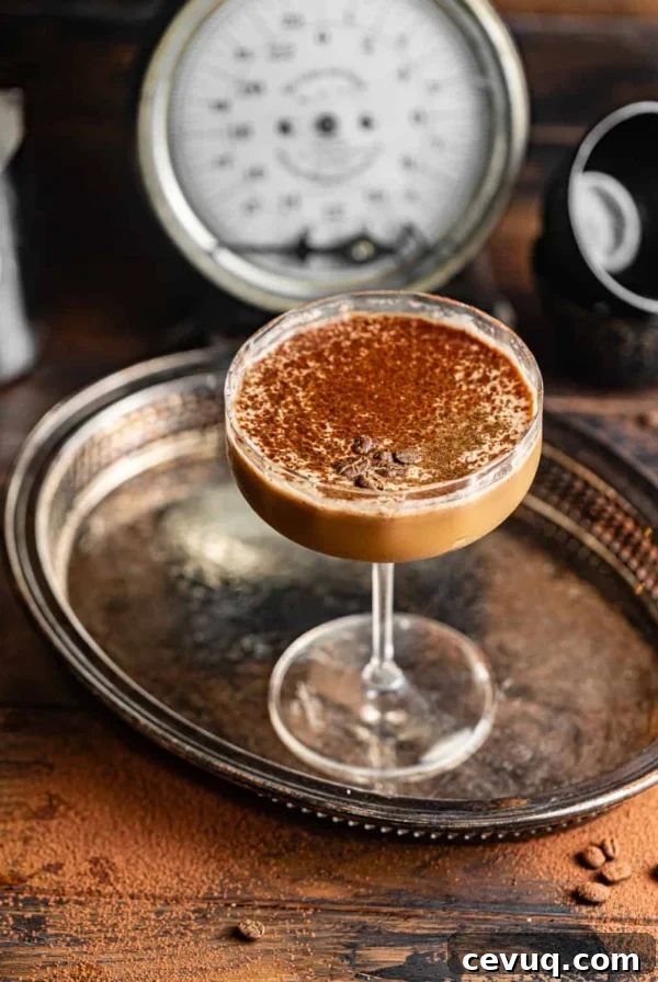 an espresso martini in a couple glass.