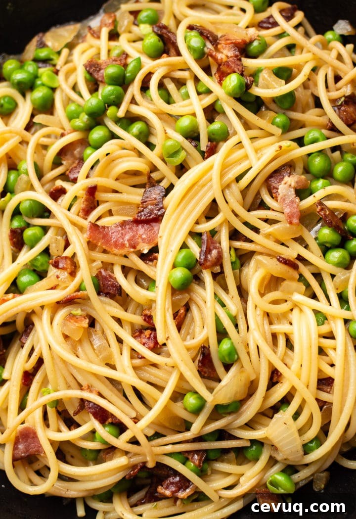 close-up of bacon and pea pasta