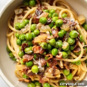 bacon and pea pasta in a bowl