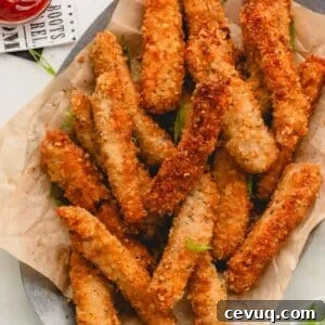 A basket of fried pork srtrips.