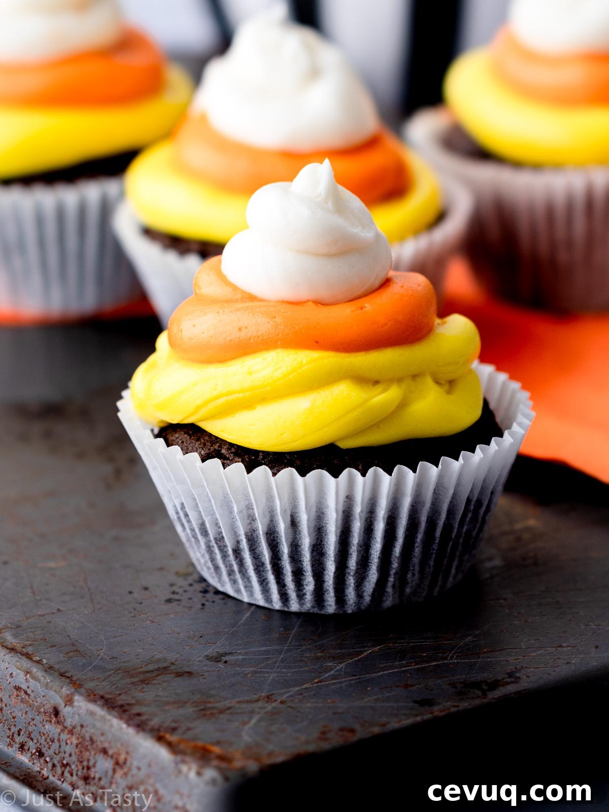 Candy Corn Cupcakes for Halloween: Festive Cupcake Recipe 3 Close-up of a frosted candy corn cupcake.