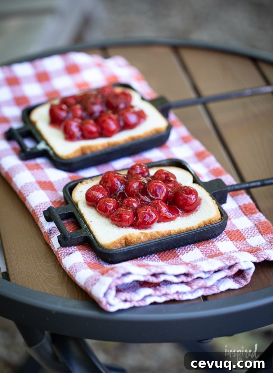 making a cherry mountain pie in mountain pie maker.