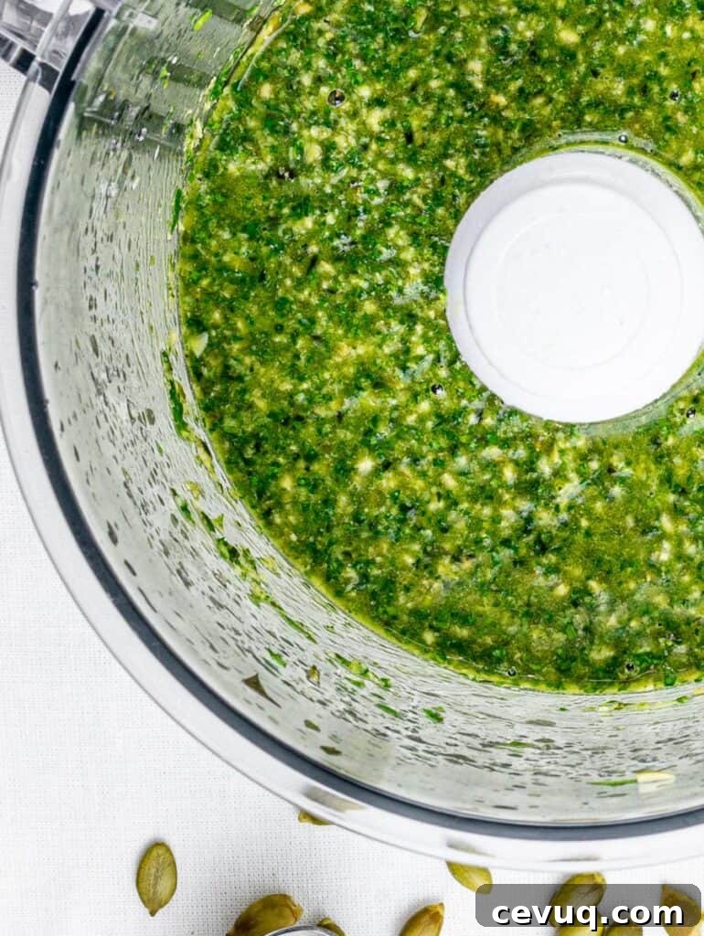 vegan pumpkin seed pesto with parsley and basil in a food processor