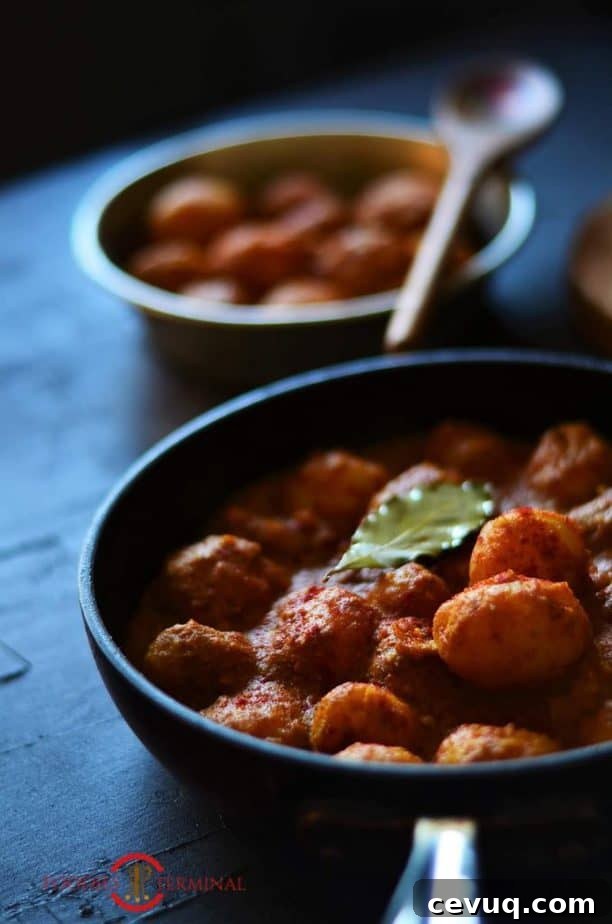 Badami aloo served in two containers.