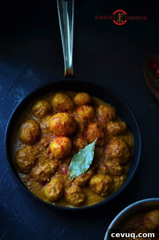 Badami aloo served in a pan.