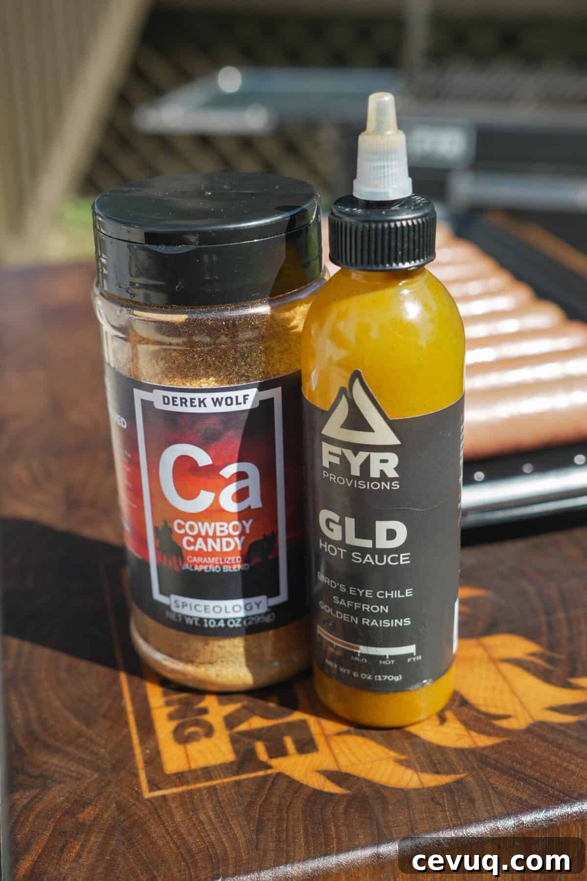 Cowboy Candy and FYR GLD sauce on the cutting board.