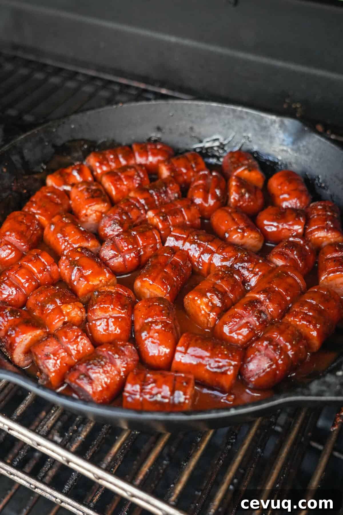 The smoked dogs on the smoker.