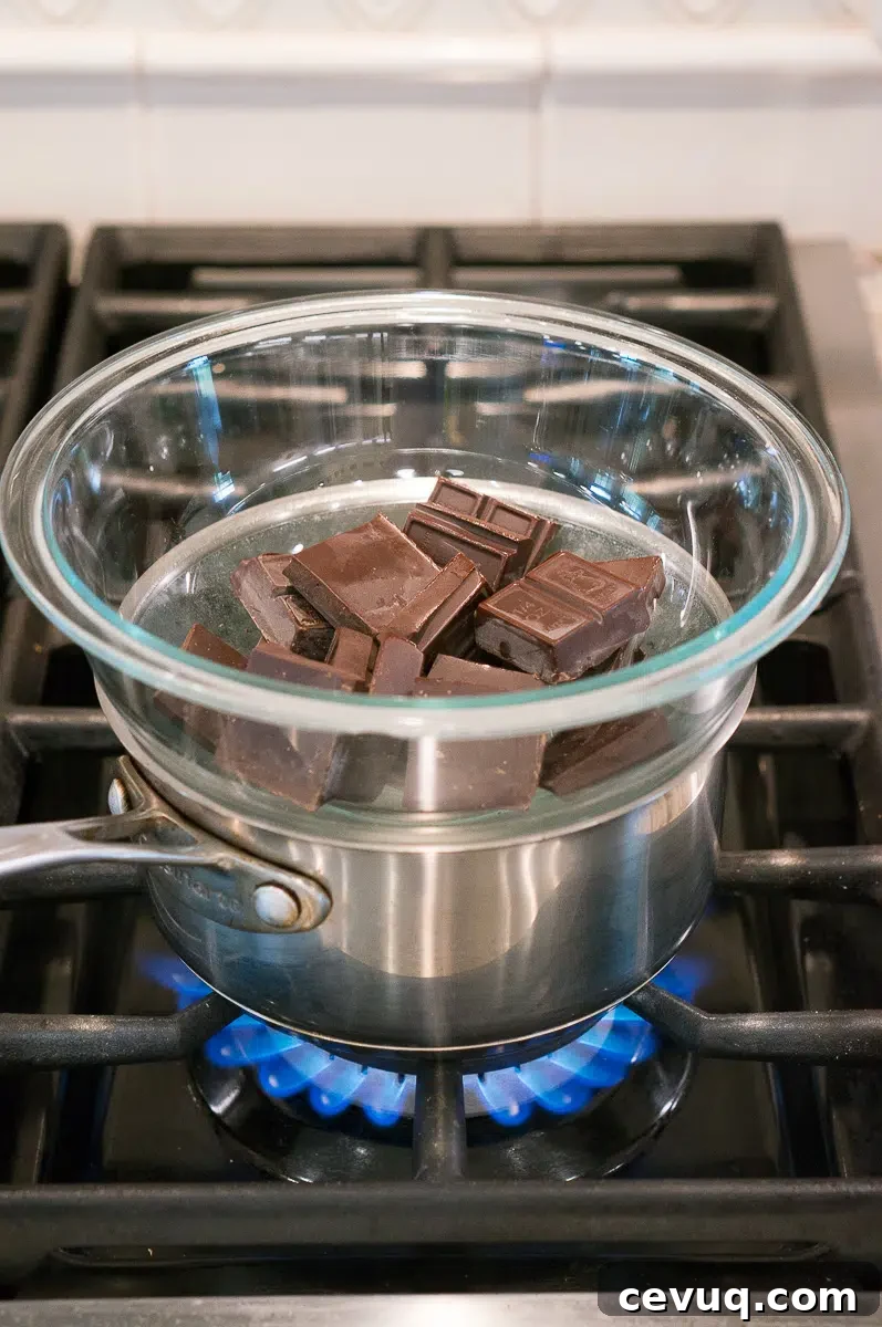 melting chocolate on the stove over hot water