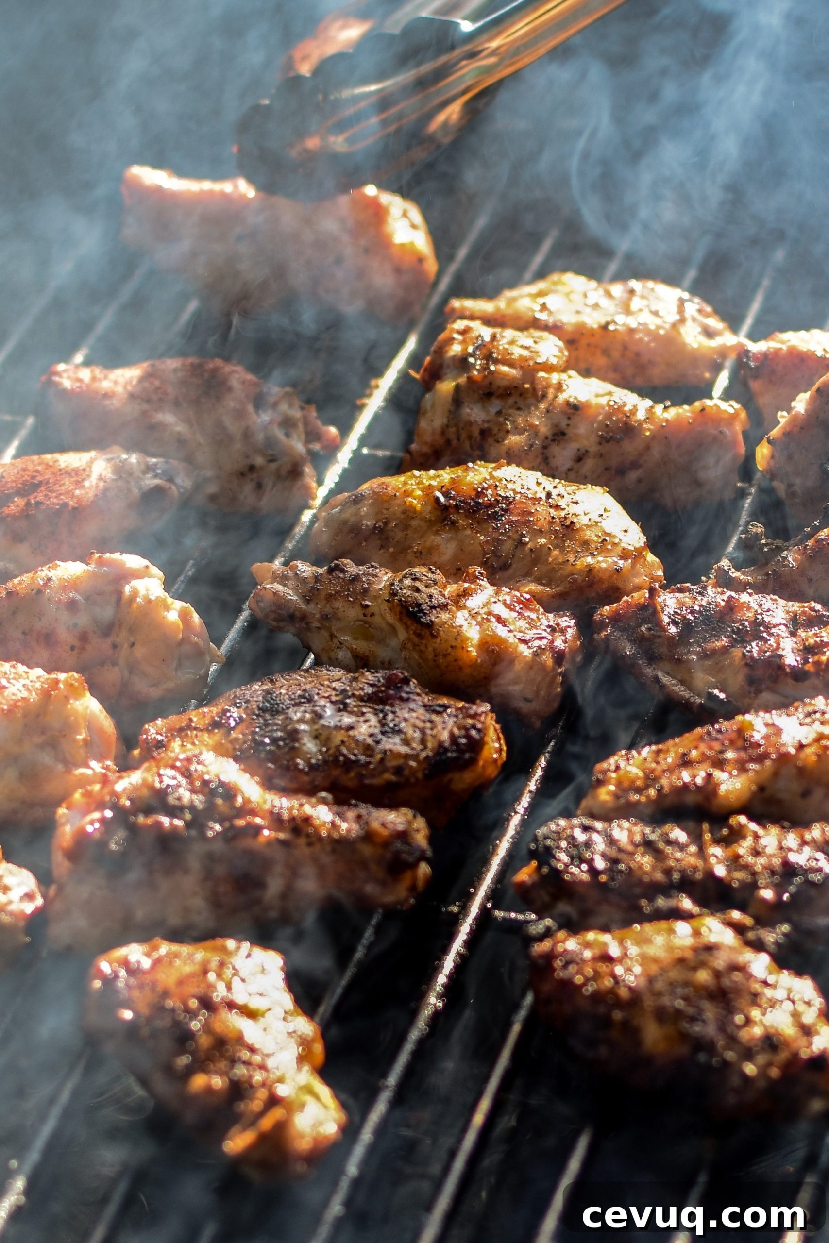 Grilling chicken wings in the sunshine for the Smoky Habanero Barbecue Grilled Chicken Wings