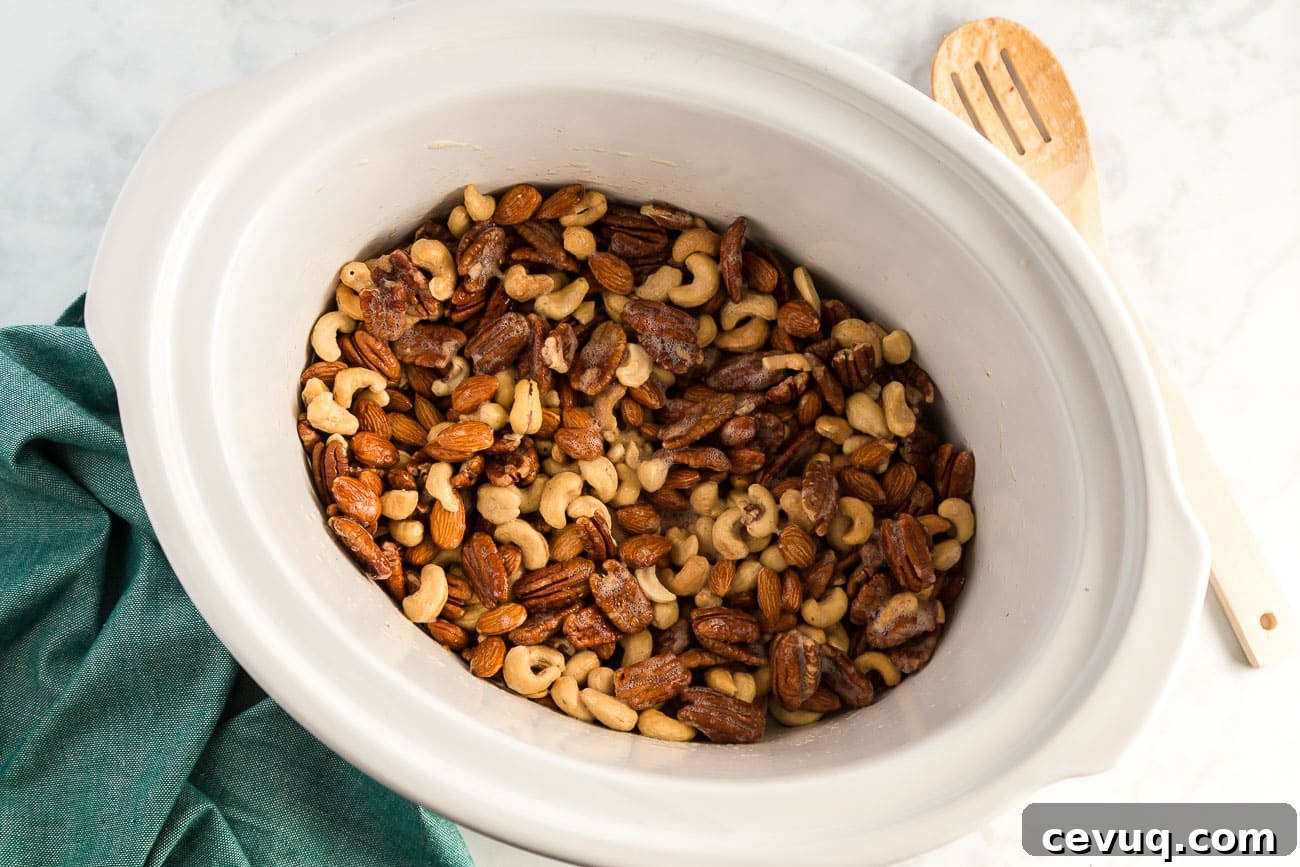 cashews, pecans, and almonds in a slow cooker
