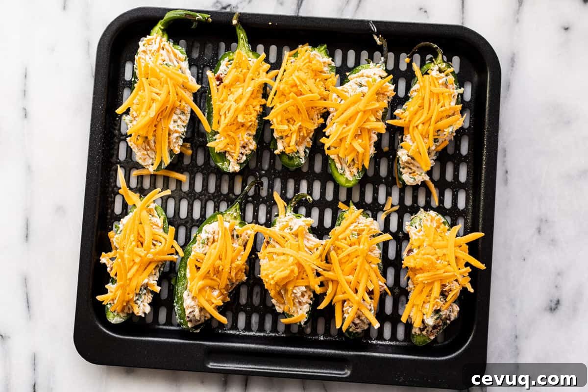 Air fryer jalapeno poppers about to go in the air fryer.
