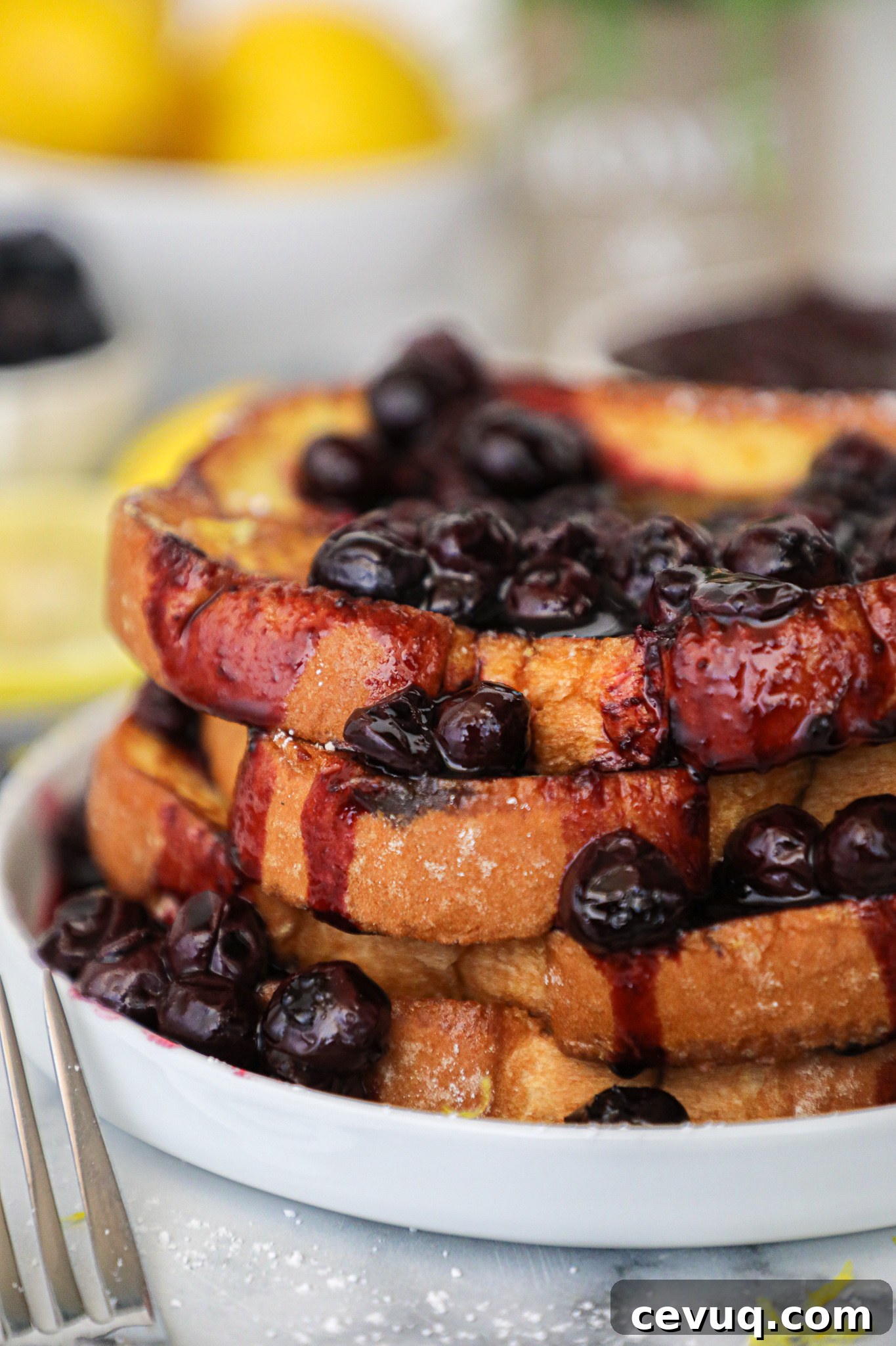 Thick fluffy slices of lemon french topped with a sweet blueberry compote! It doesn't get any better than this for a summery breakfast or brunch!