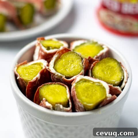 white bowl full of dried beef pickle roll ups