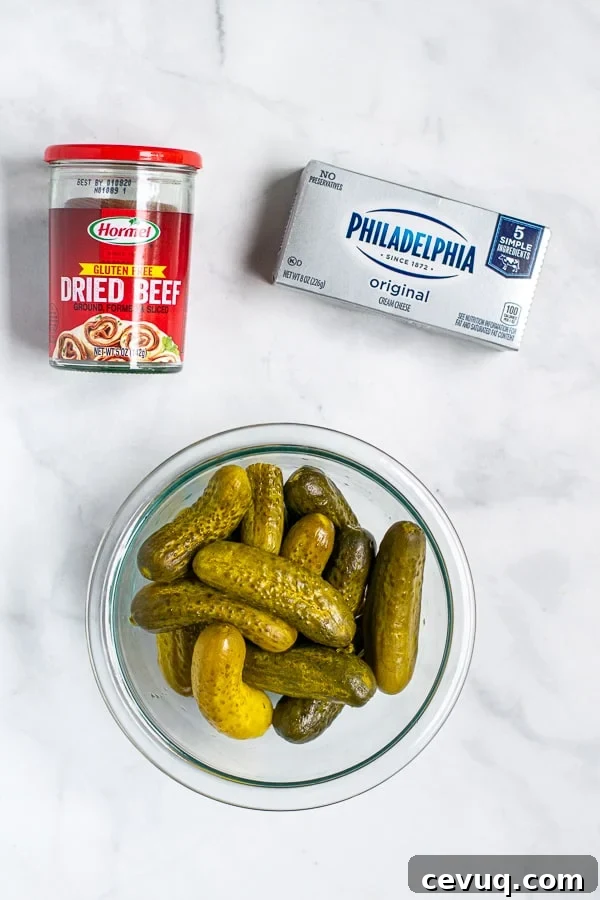 flatly of the three ingredients dried beef, baby dill pickles, and cream cheese
