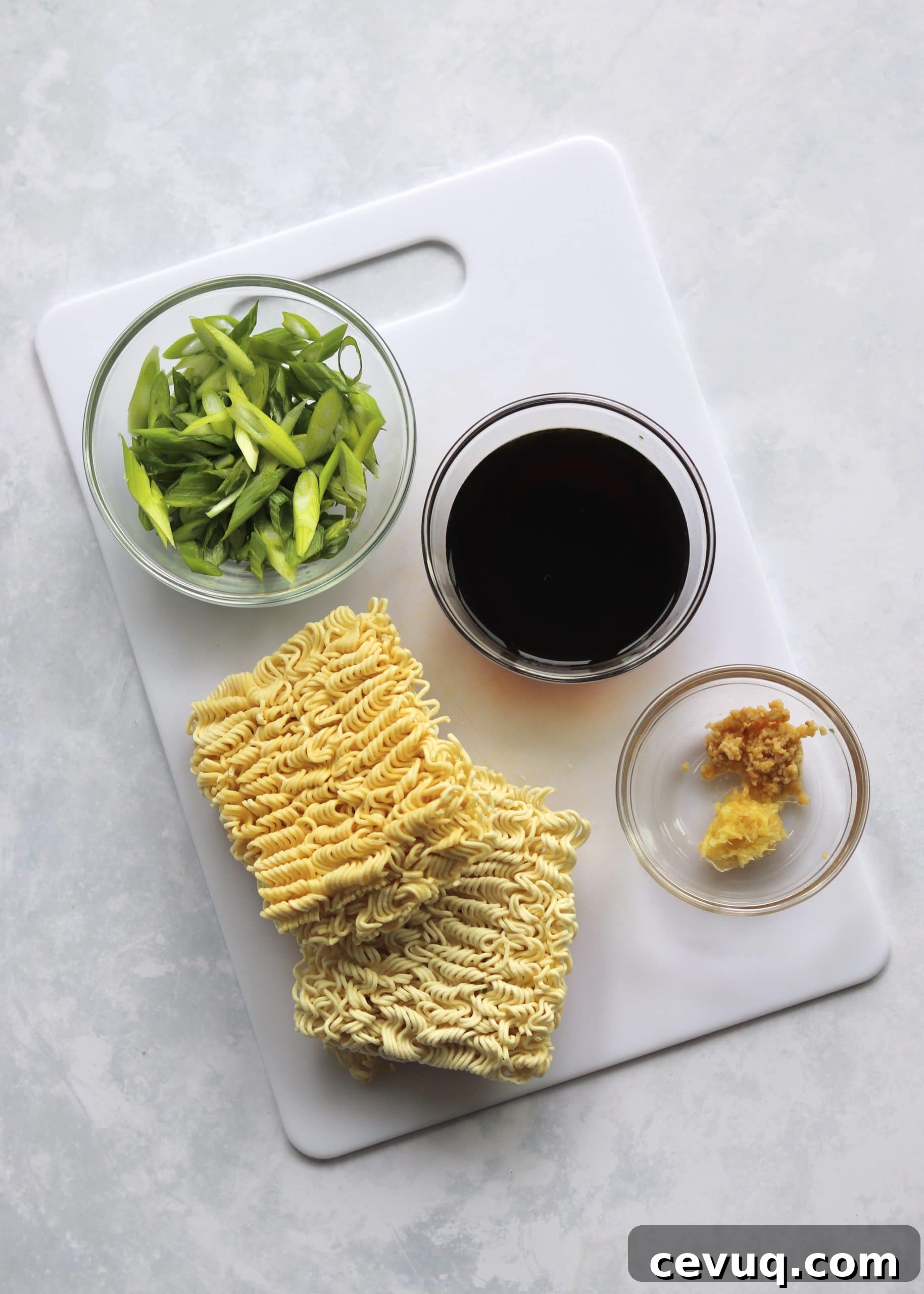 Garlic Sesame Ramen for Two: Quick Homemade Recipe 3 Ramen, green onions, soy sauce mixture, garlic, and ginger in small bowls