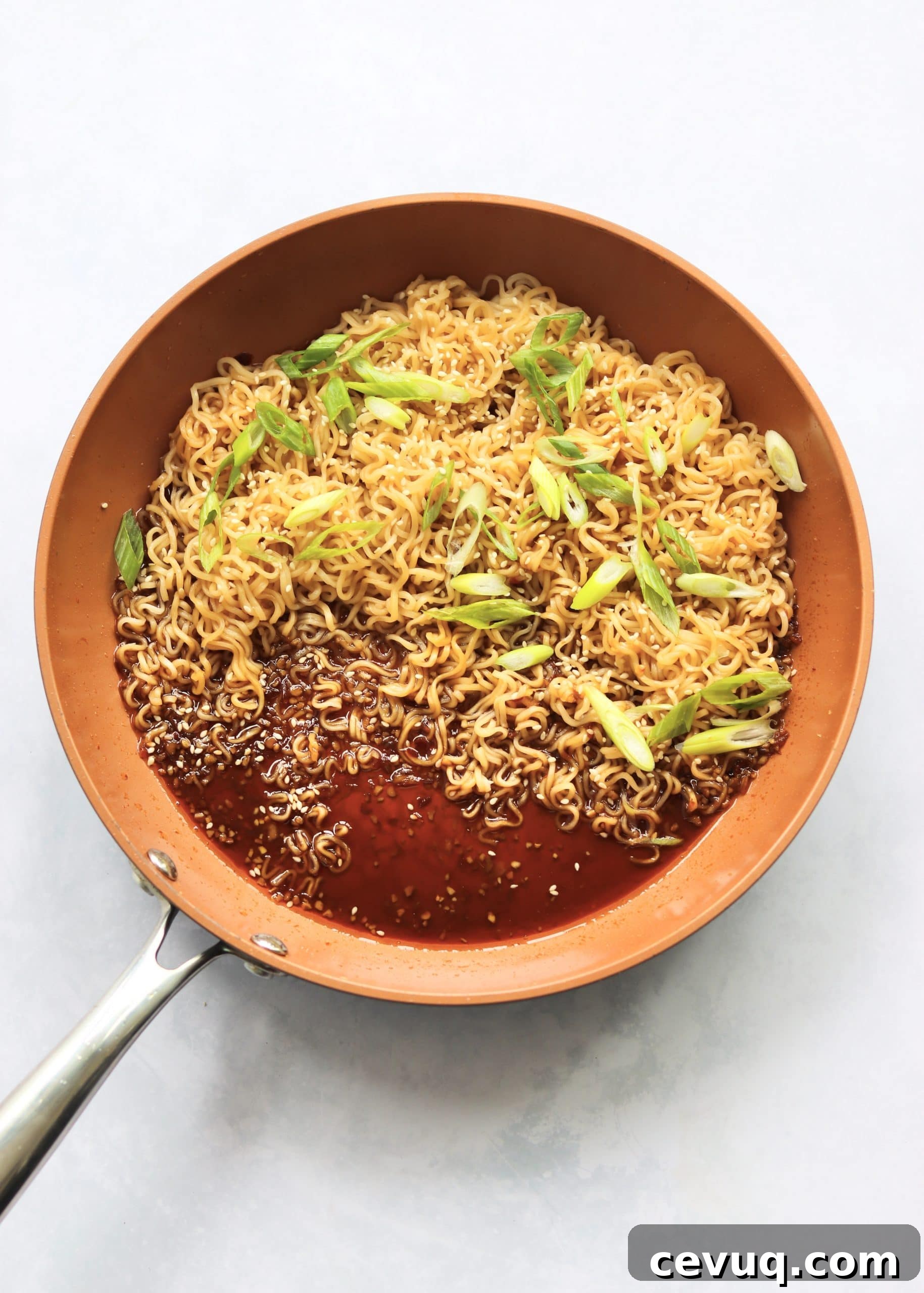 Garlic Sesame Ramen for Two: Quick Homemade Recipe 4 Ramen noodles and sauce in skillet
