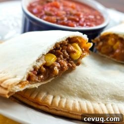 Corn and ground beef empanadas with salsa