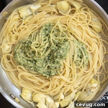 Pesto added to pasta