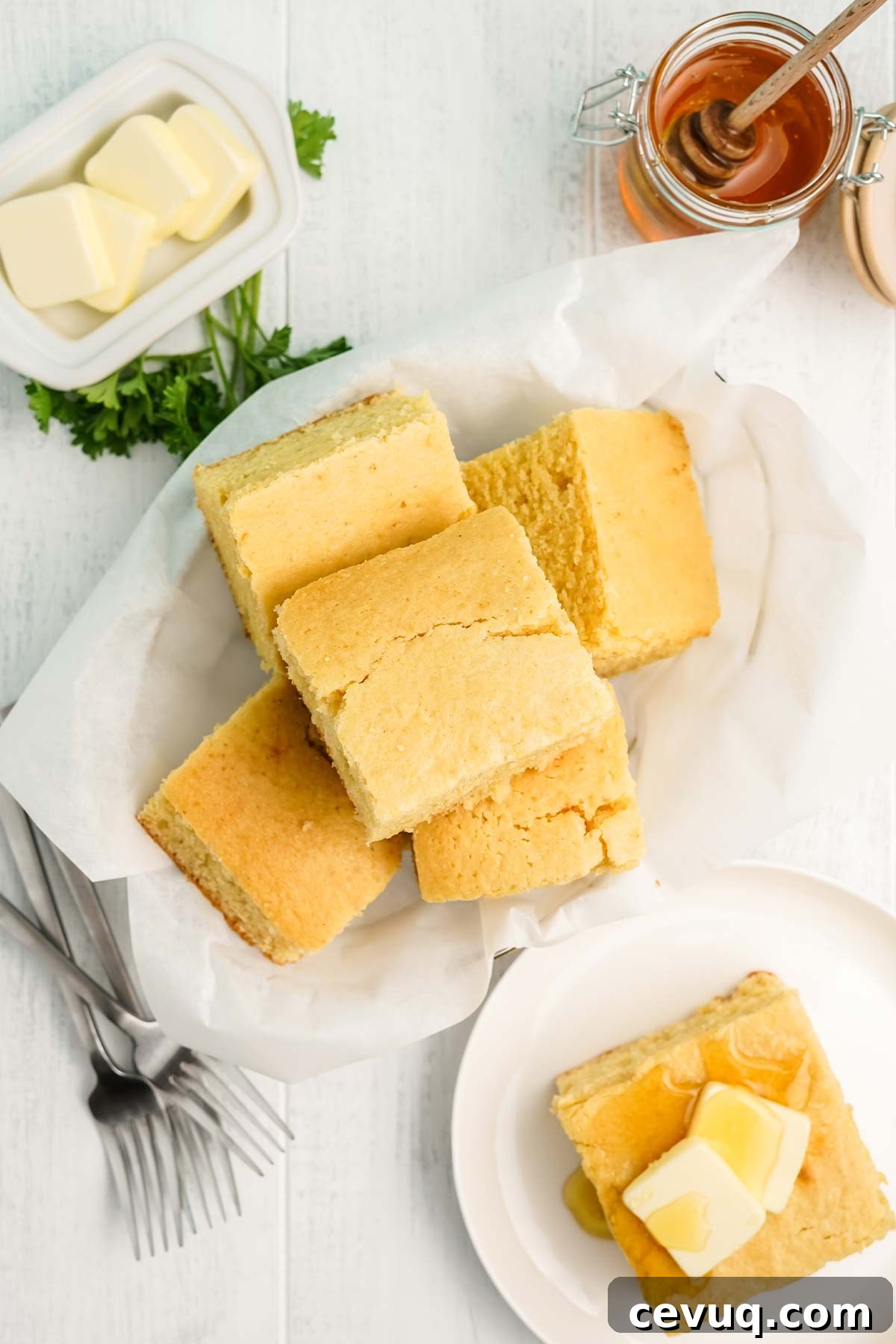 Basket of cornbread on the table.