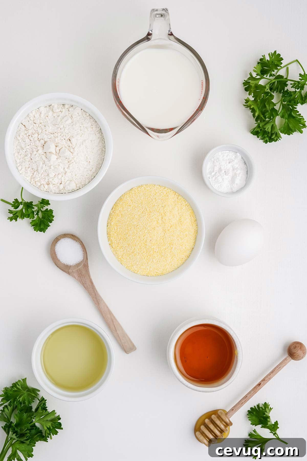 Ingredients to make cornbread with honey on the table.