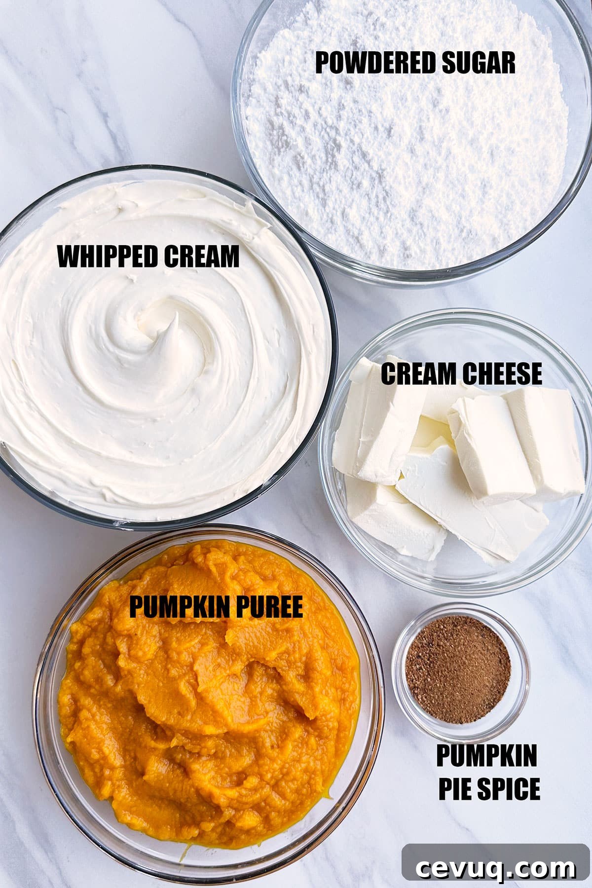 Ingredients in Bowls For Sweet Dip on White Marble Background.