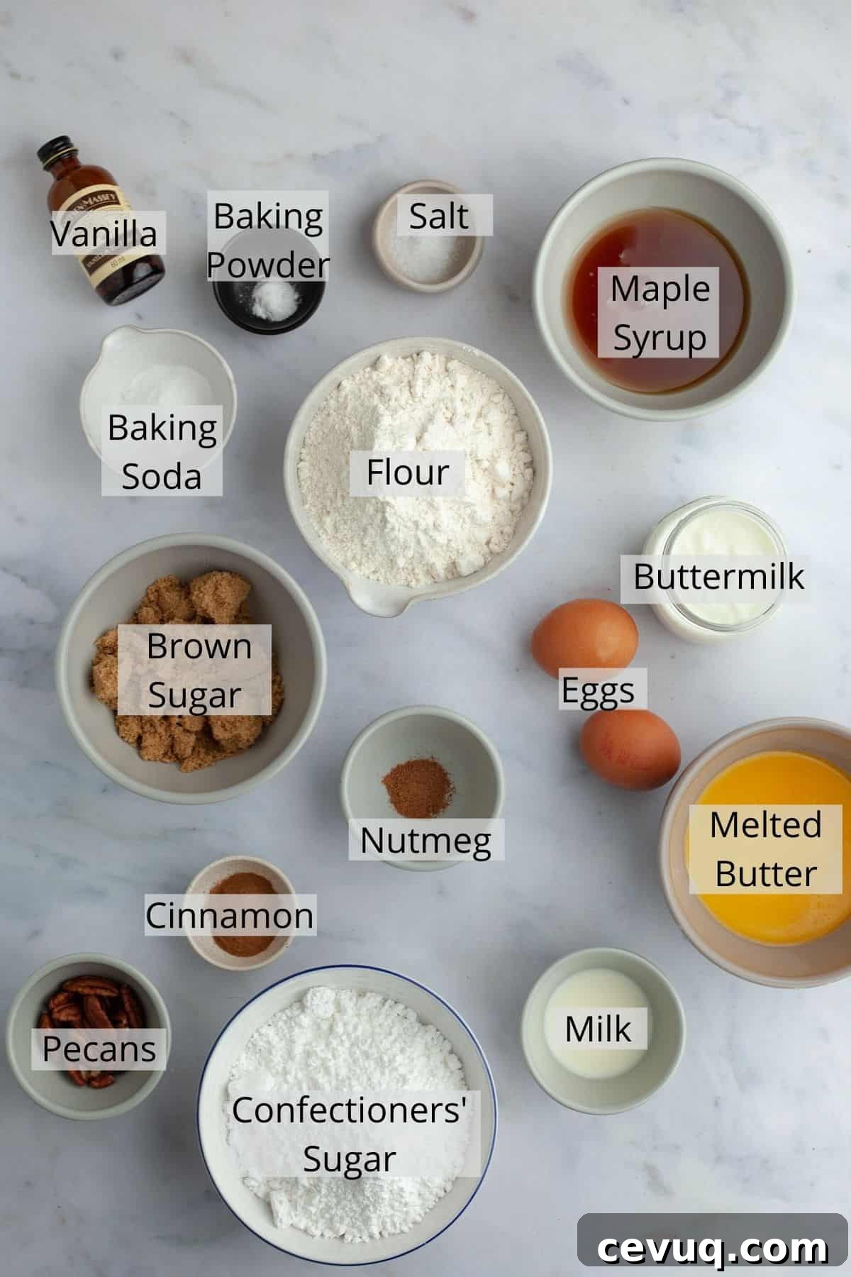 ingredients for maple glazed donuts in a variety of small bowls