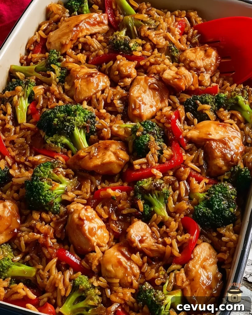 Close-up of Rice for Teriyaki Chicken with broccoli, carrots, and fluffy rice.