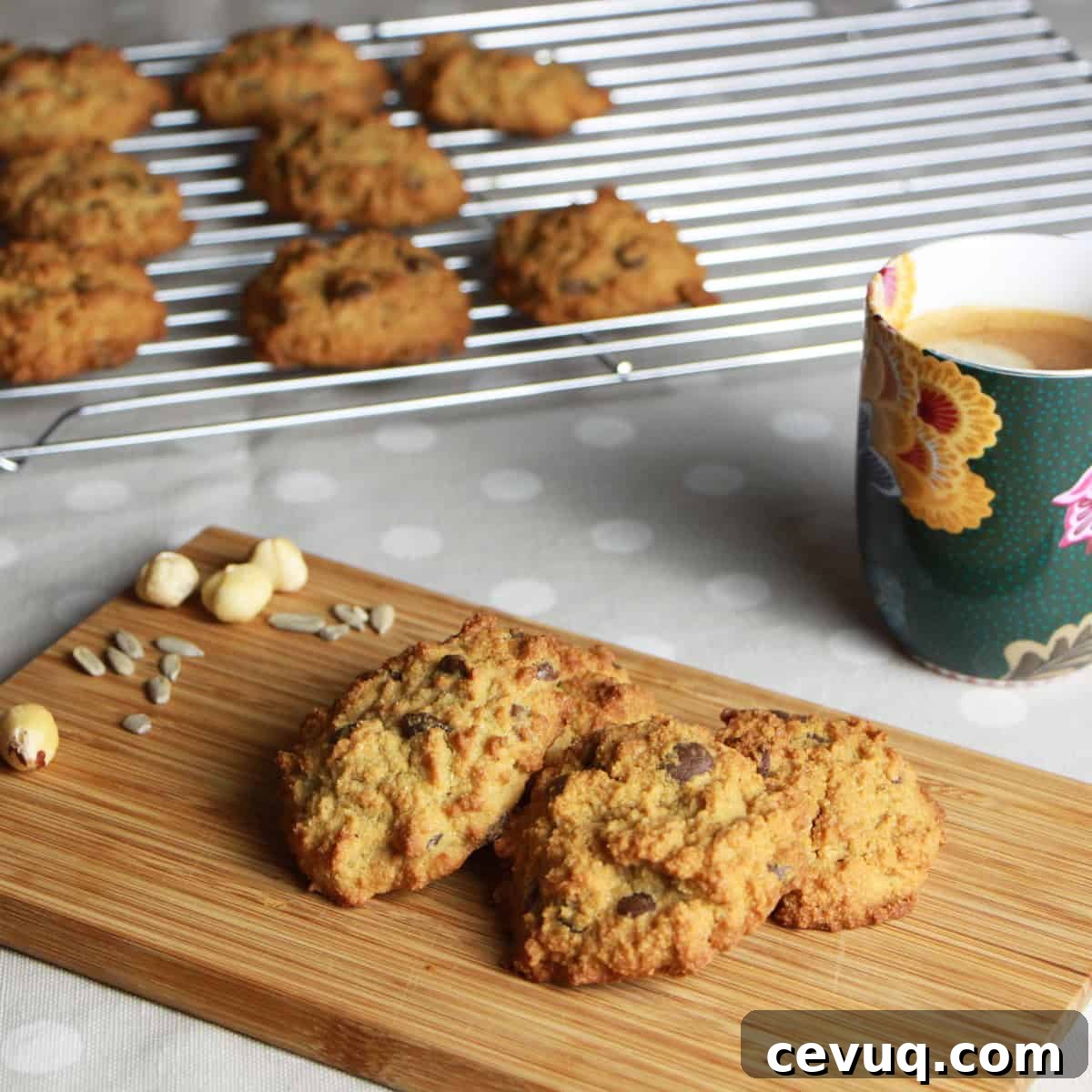 Hazelnut choc-chip cookies on a chopping board