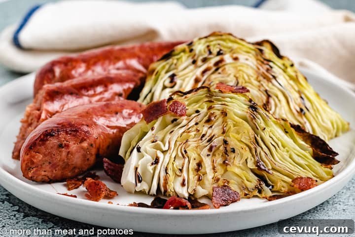 Roasted cabbage wedges with balsamic and bacon on a plate.