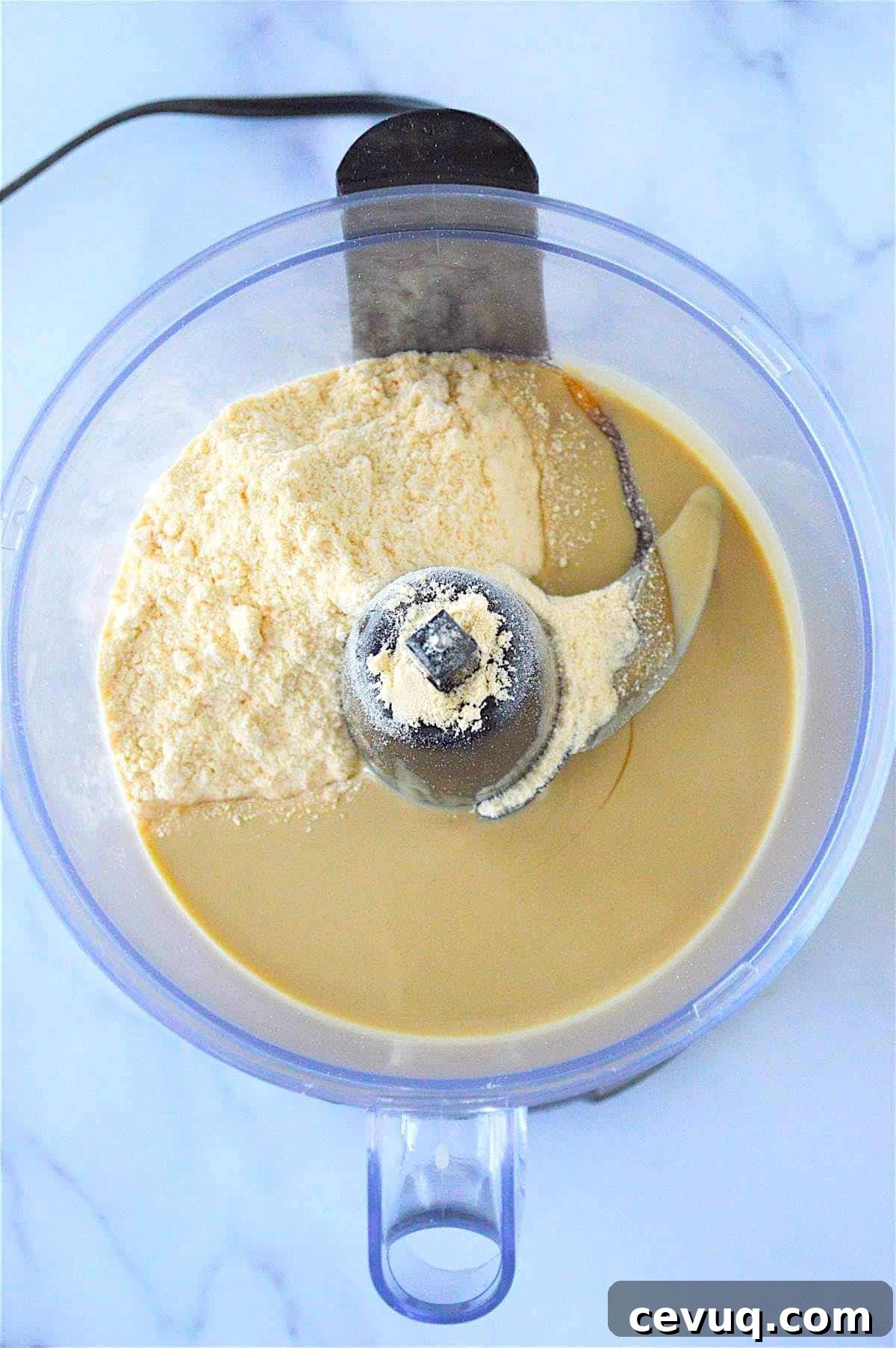 No-Bake Energy Bites Recipe for Quick, Protein-Packed Snacks 5 Tahini, honey, and coconut flour in a food processor.