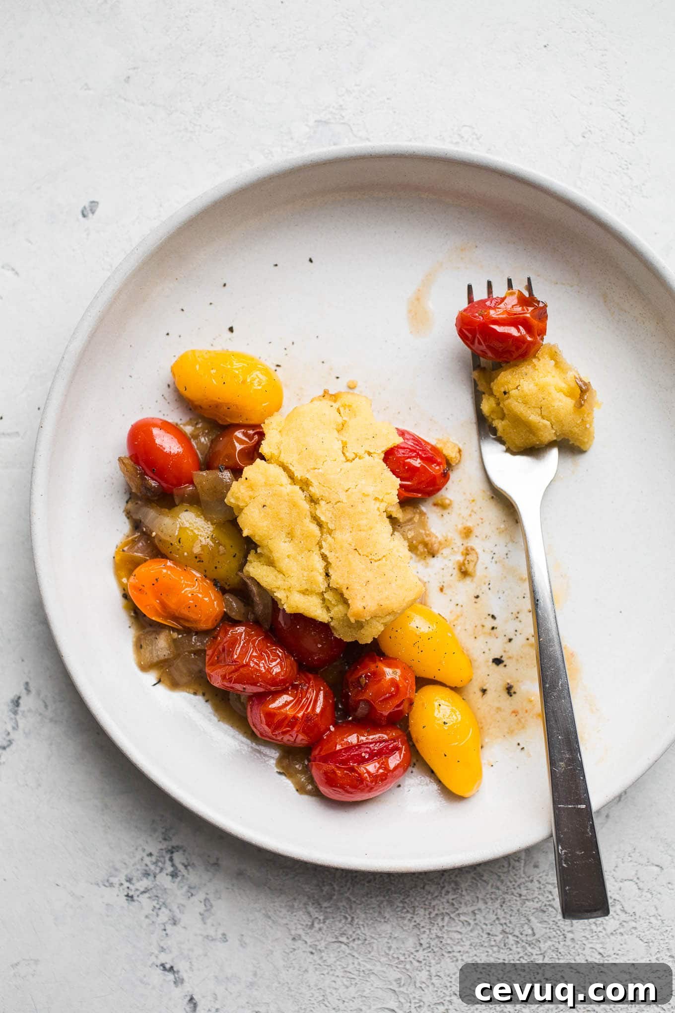Gluten-Free Tomato Cobbler with Corn Flour Biscuits on white plate