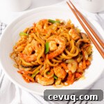 Shrimp Yaki Udon Recipe: Savory Stir-Fried Udon with Shrimp 12 Shrimp yaki udon in a white bowl.