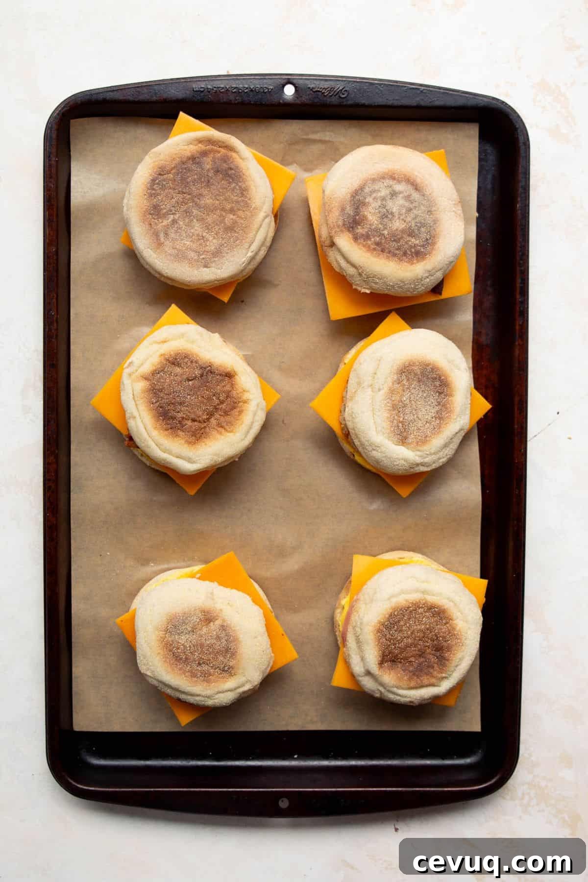 Assembled high-protein breakfast sandwiches ready for freezing.